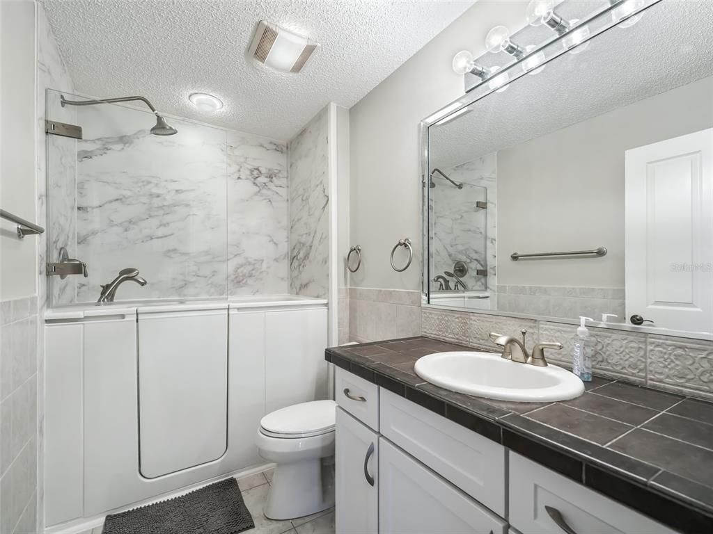 Bathroom, Interior, Marble Walls, Recessed Lighting, Tile Countertops