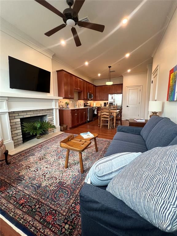 Dining room, Fireplace, Interior, Kitchen, Living room, Pendant Lights, Recessed Lighting, Wood Texture Flooring