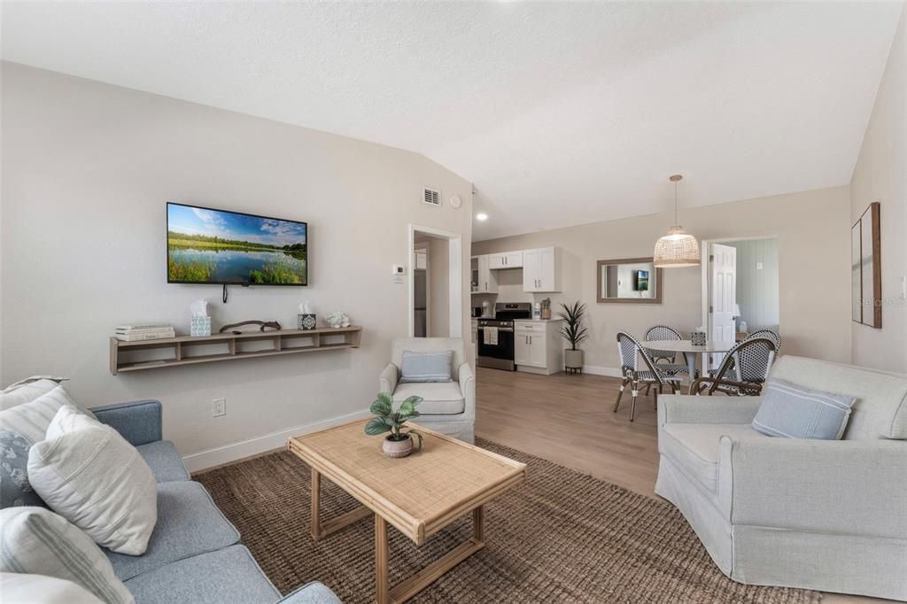 Dining room, Interior, Kitchen, Living room, Pendant Lights, Stainless Steel Appliances, Wood Texture Flooring
