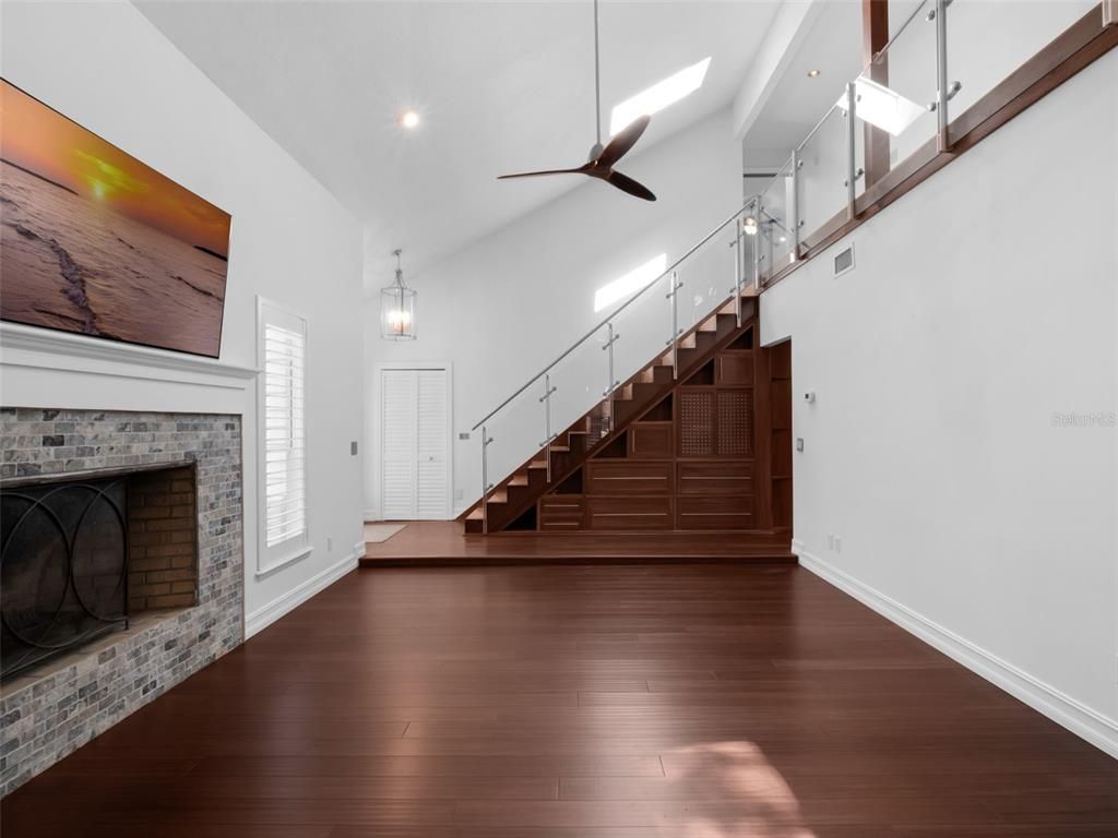 Fireplace, Interior, Pendant Lights, Recessed Lighting, Wood Texture Flooring