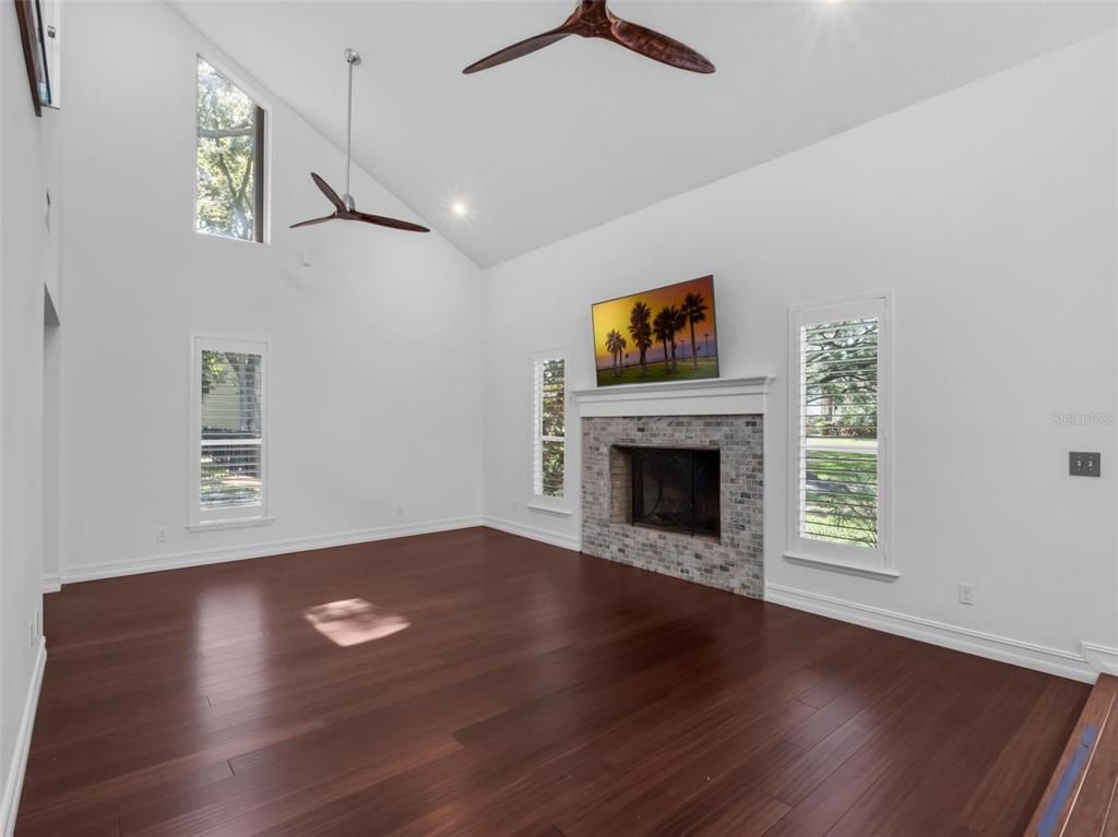 Empty room, Fireplace, Interior, Recessed Lighting, Wood Texture Flooring