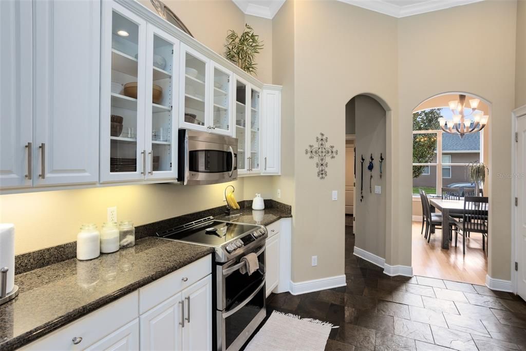 Chandelier, Dining room, Interior, Kitchen, Stainless Steel Appliances, Wood Texture Flooring