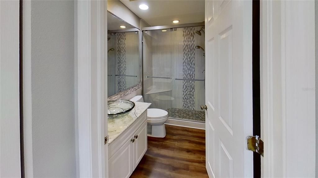 Bathroom, Glass Shower, Interior, Recessed Lighting, Wood Texture Flooring