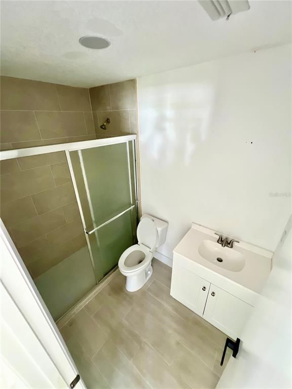 Bathroom, Glass Shower, Interior, Wood Texture Flooring