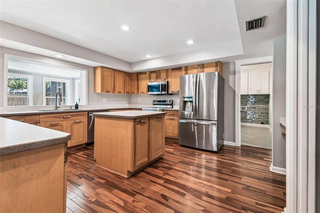 Interior, Kitchen, Recessed Lighting, Stainless Steel Appliances, Wood Texture Flooring