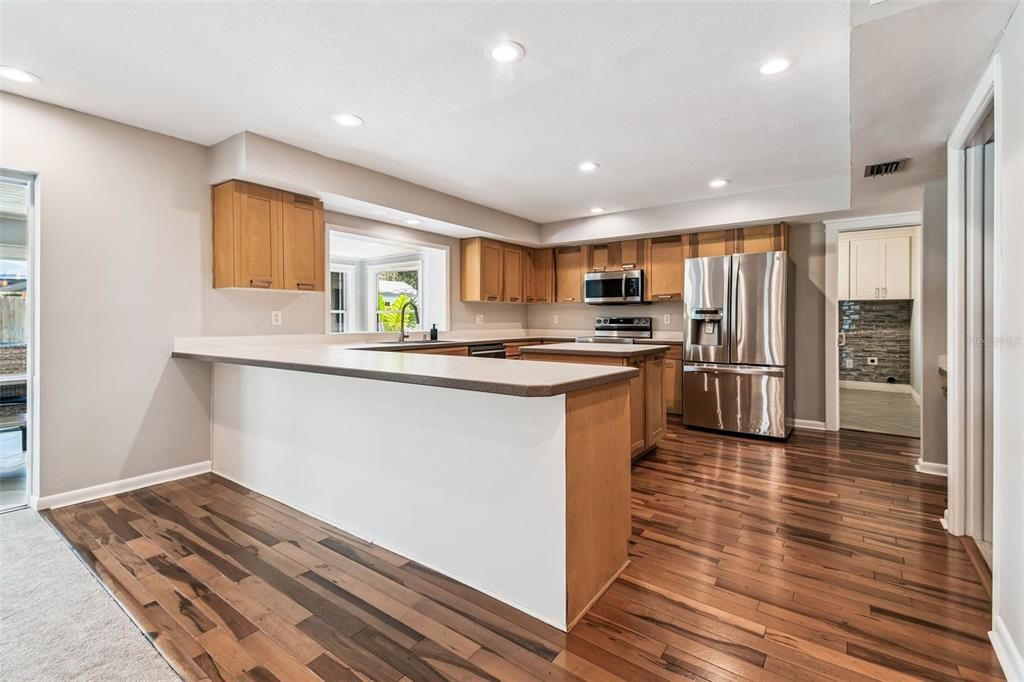 Interior, Kitchen, Recessed Lighting, Stainless Steel Appliances, Wood Texture Flooring