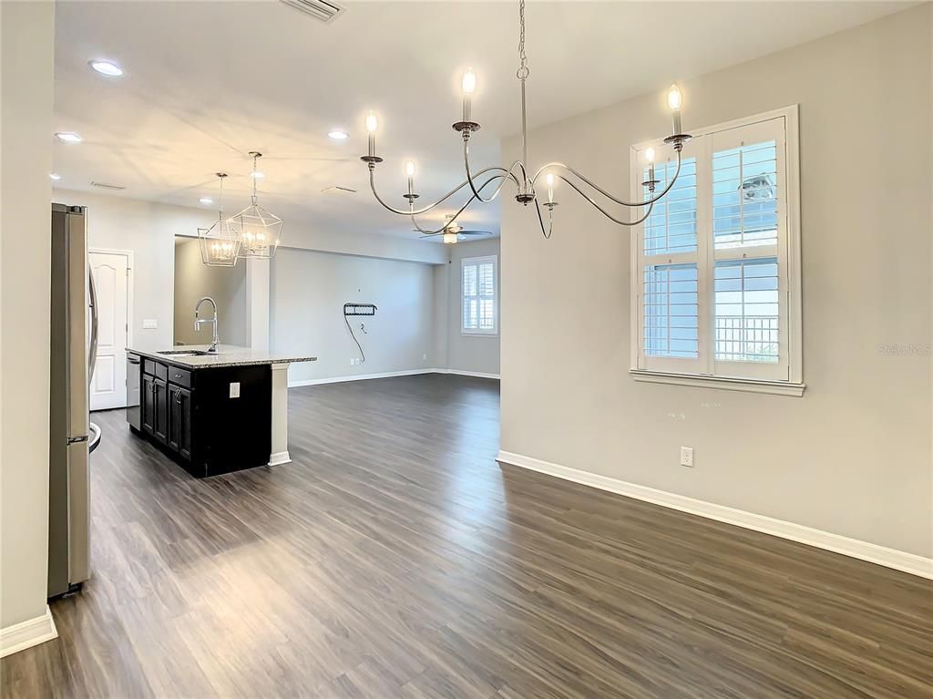 Chandelier, Empty room, Interior, Kitchen, Pendant Lights, Recessed Lighting, Wood Texture Flooring