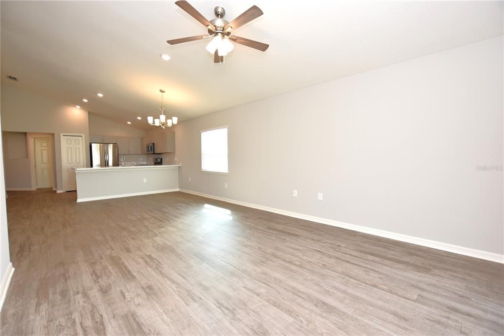 Chandelier, Empty room, Interior, Kitchen, Pendant Lights, Recessed Lighting, Wood Texture Flooring