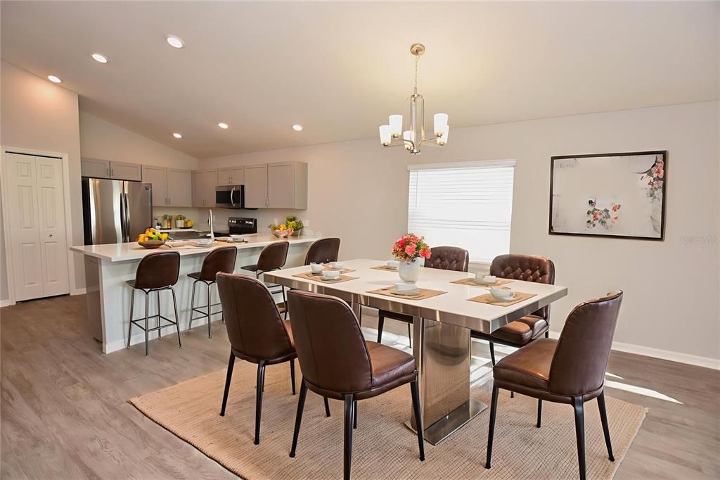 Chandelier, Dining room, Interior, Kitchen, Pendant Lights, Recessed Lighting, Stainless Steel Appliances, Wood Texture Flooring