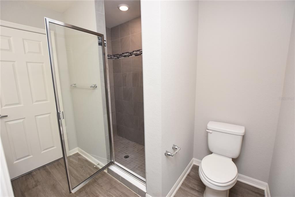 Bathroom, Glass Shower, Interior, Recessed Lighting, Wood Texture Flooring