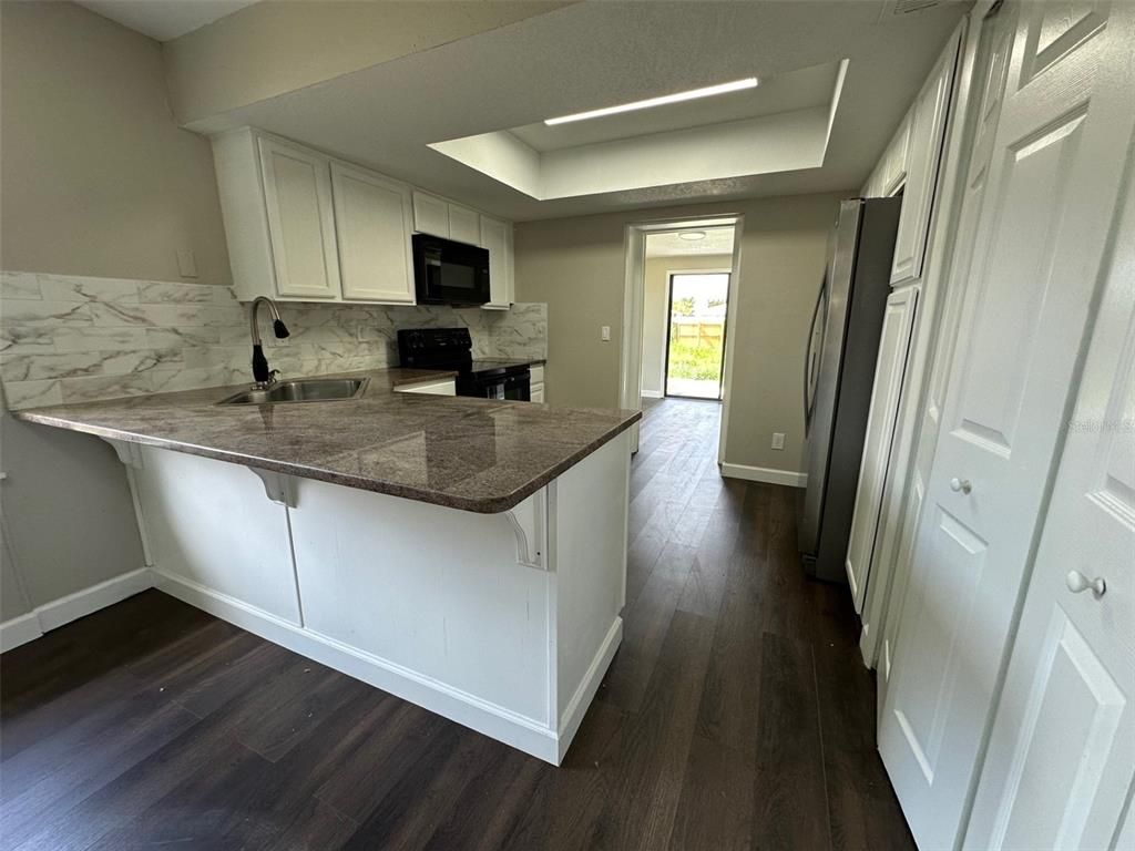 Interior, Kitchen, Marble Walls, Recessed Lighting, Wood Texture Flooring