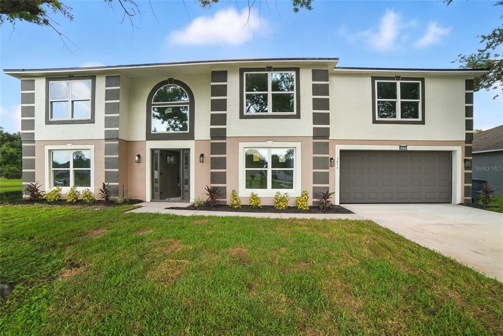 Attached, Exterior, Facade, Raised Ranch