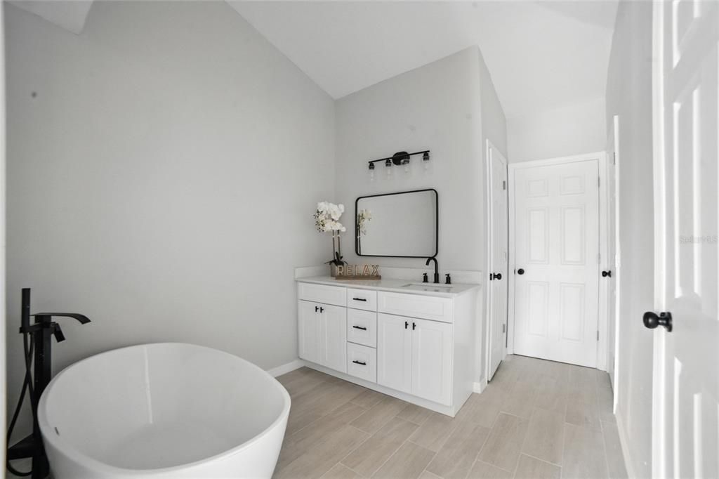 Bathroom, Dual Sink Vanities, Free Standing Baths, Interior, Wood Texture Flooring