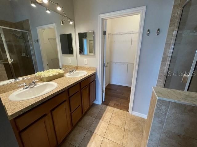 Bathroom, Dual Sink Vanities, Glass Shower, Interior, Wood Texture Flooring