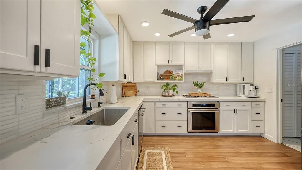 Interior, Kitchen, Recessed Lighting, Stainless Steel Appliances, Wood Texture Flooring