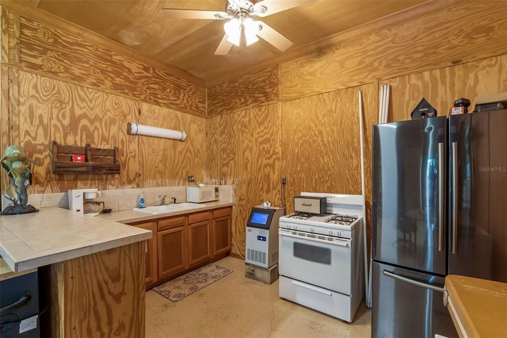 Interior, Kitchen, Tile Countertops, Wooden Walls