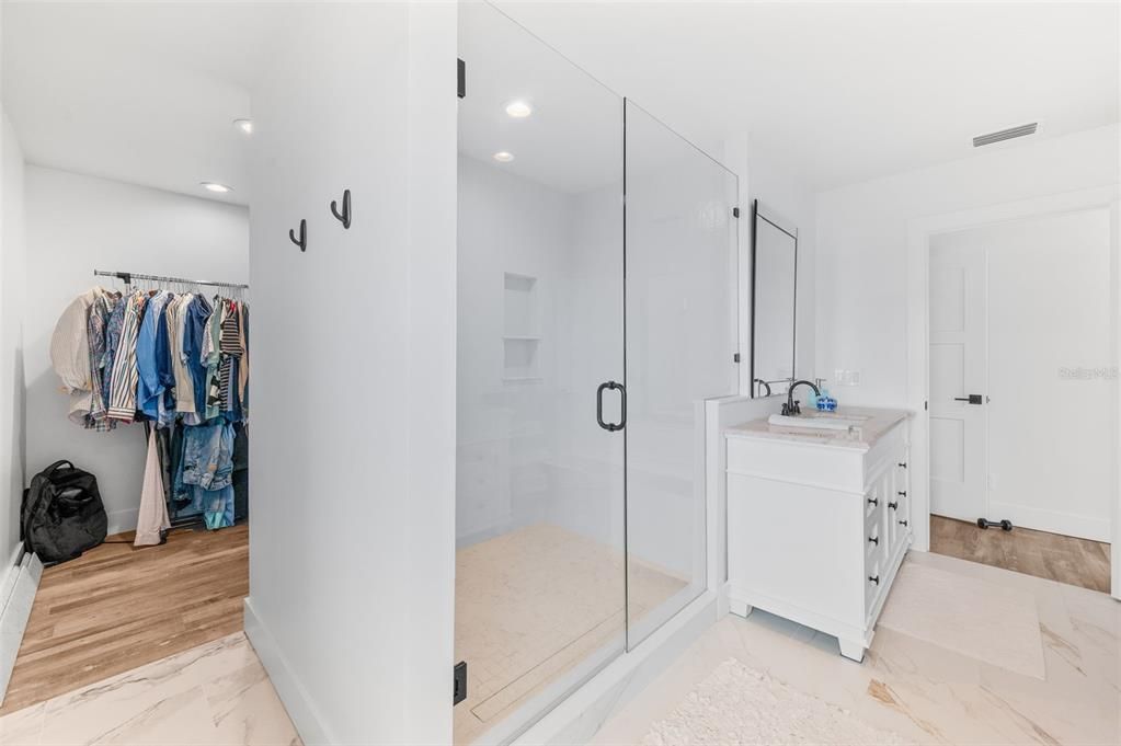 Bathroom, Glass Shower, Interior, Marble, Recessed Lighting, Walk-in Closets, Wood Texture Flooring