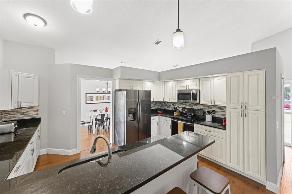 Interior, Kitchen, Pendant Lights, Stainless Steel Appliances, Wood Texture Flooring