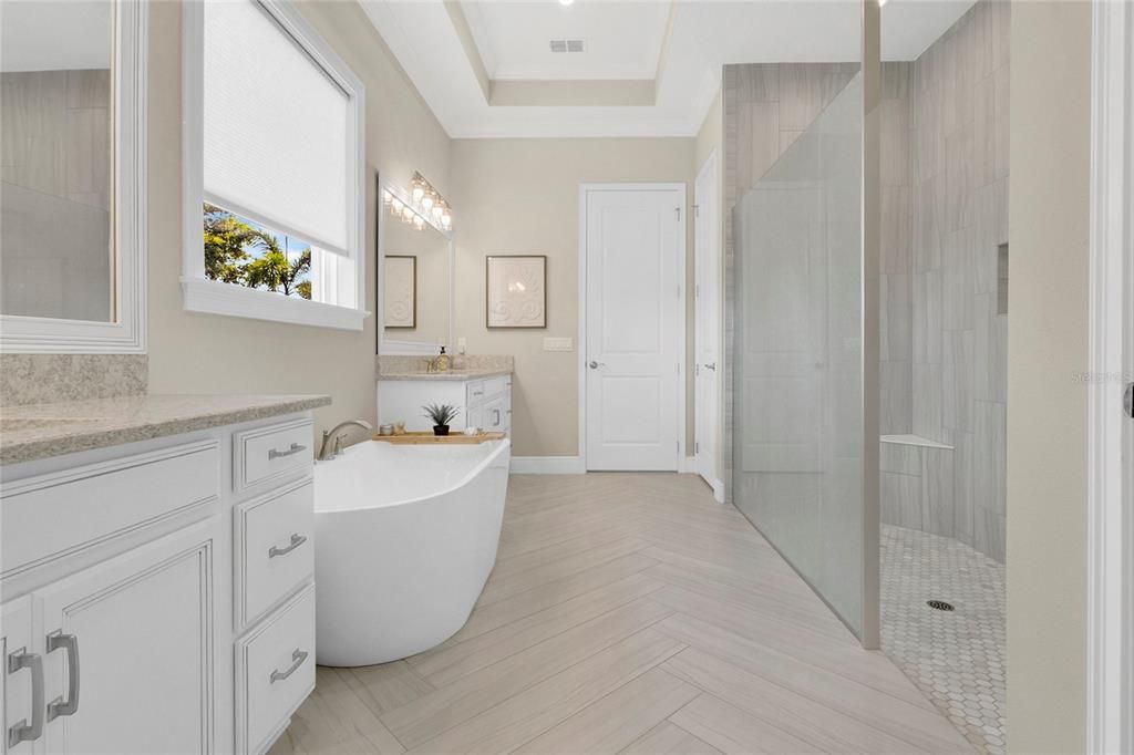 Bathroom, Dual Sink Vanities, Free Standing Baths, Glass Shower, Interior, Wood Texture Flooring