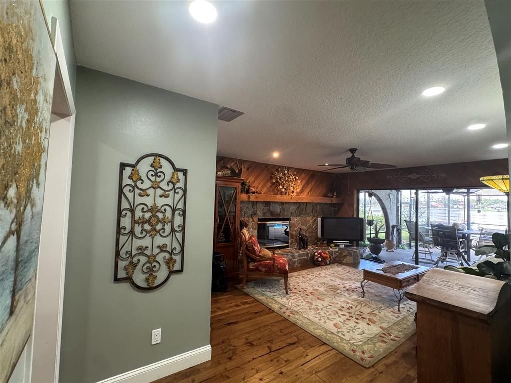 Fireplace, Interior, Living room, Recessed Lighting, Wood Texture Flooring