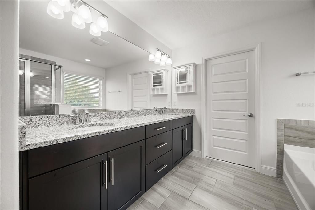Bathroom, Dual Sink Vanities, Interior, Recessed Lighting, Wood Texture Flooring