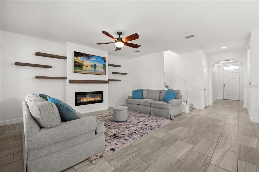 Fireplace, Interior, Living room, Recessed Lighting, Wood Texture Flooring
