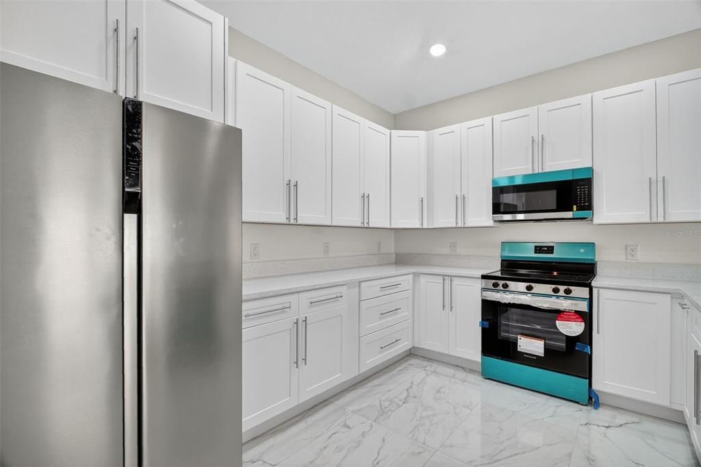 Interior, Kitchen, Marble, Recessed Lighting, Stainless Steel Appliances