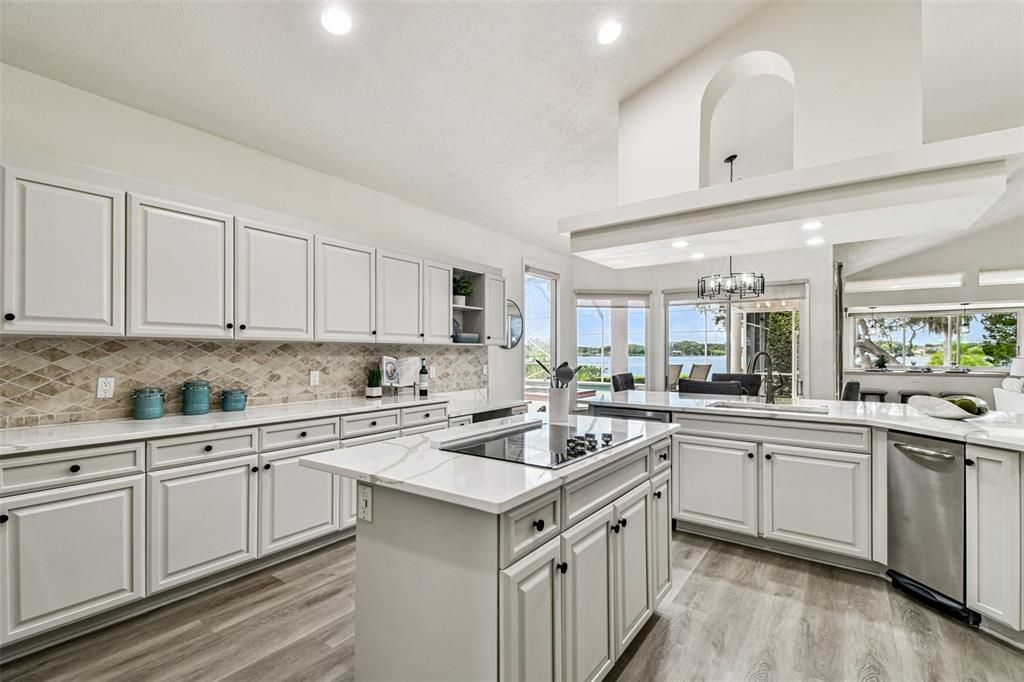 Chandelier, Dining room, Interior, Kitchen, Pendant Lights, Recessed Lighting, Water, Wood Texture Flooring