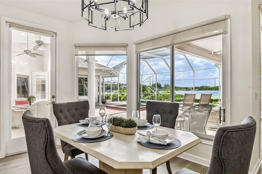Chandelier, Dining room, Glass Ceilings, Interior, Sun Room, Water, Wood Texture Flooring