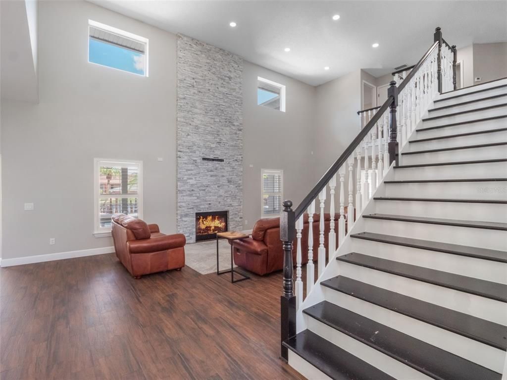 Fireplace, Interior, Living room, Recessed Lighting, Wood Texture Flooring