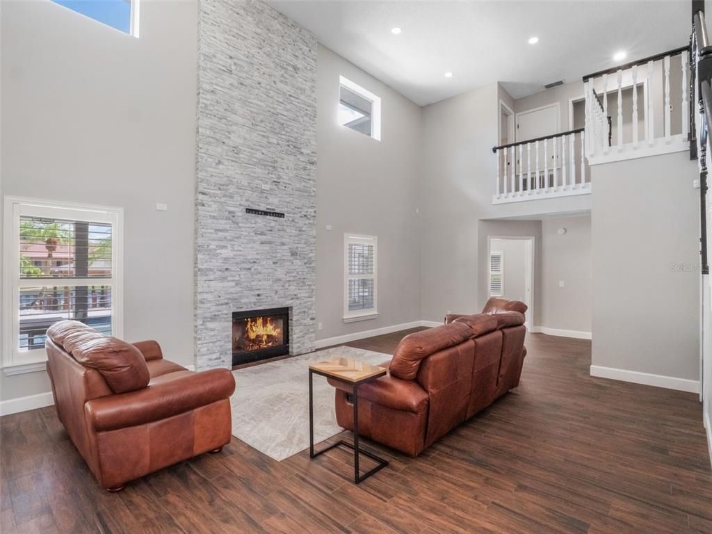 Fireplace, Interior, Living room, Recessed Lighting, Wood Texture Flooring