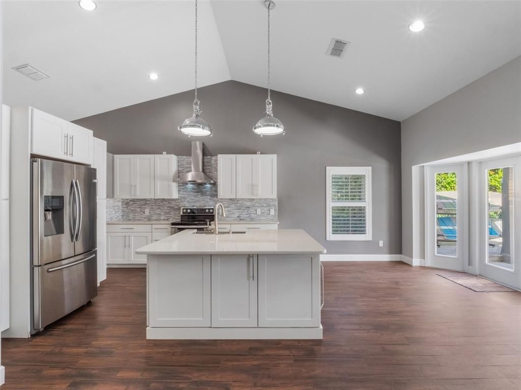 Interior, Kitchen, Pendant Lights, Recessed Lighting, Stainless Steel Appliances, Wood Texture Flooring