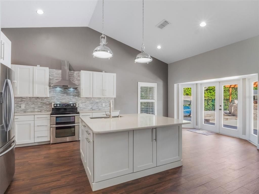 Interior, Kitchen, Pendant Lights, Recessed Lighting, Stainless Steel Appliances, Wood Texture Flooring