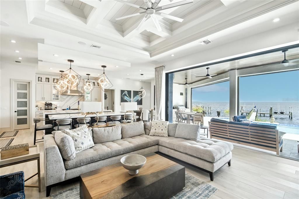 Dining room, Interior, Kitchen, Living room, Pendant Lights, Recessed Lighting, Stainless Steel Appliances, Water, Wood Texture Flooring