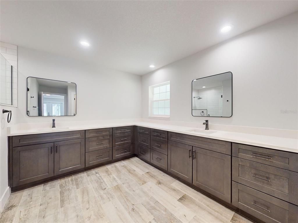 Bathroom, Dual Sink Vanities, Interior, Recessed Lighting, Wood Texture Flooring