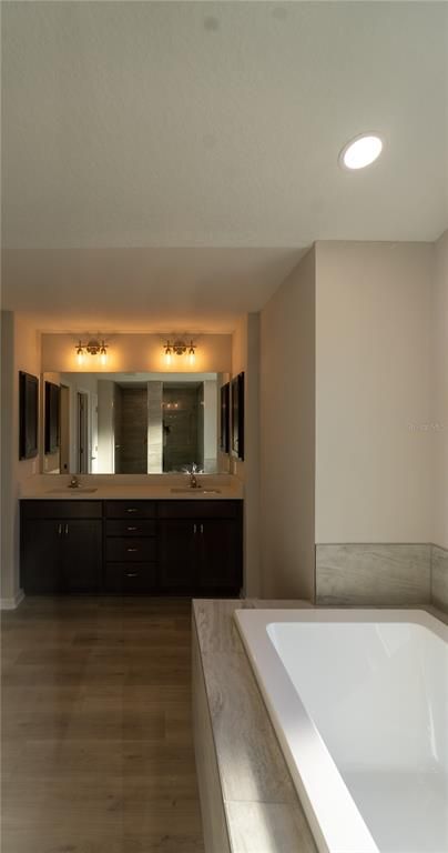 Bathroom, Dual Sink Vanities, Interior, Recessed Lighting, Wood Texture Flooring
