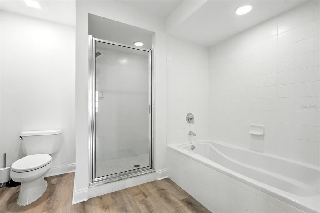 Bathroom, Glass Shower, Interior, Recessed Lighting, Wood Texture Flooring