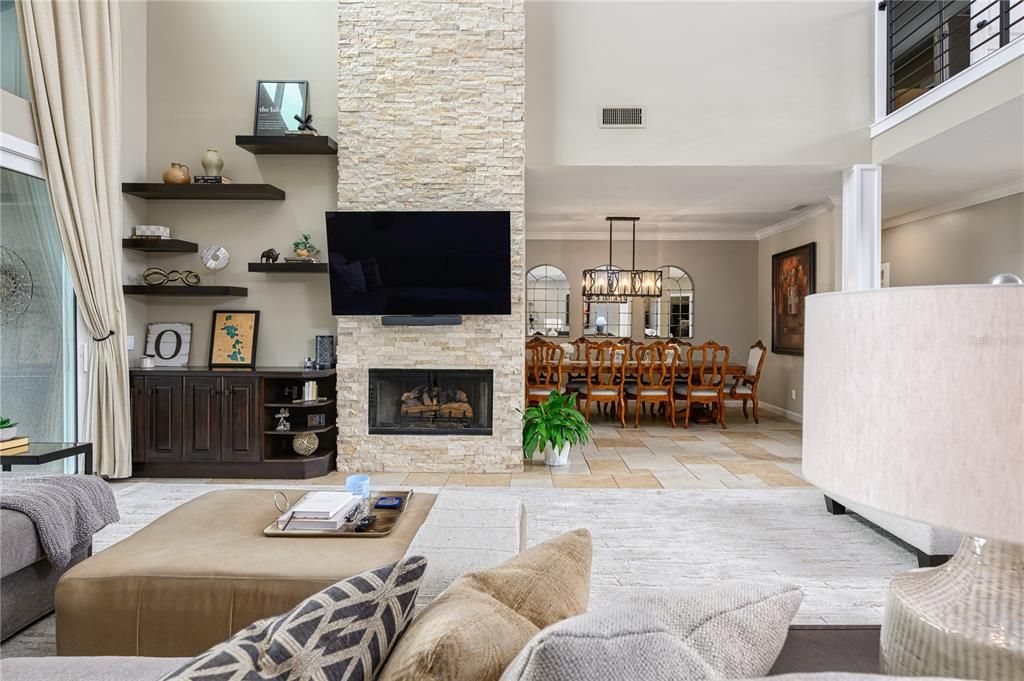 Chandelier, Dining room, Fireplace, Interior, Living room, Pendant Lights, Stone Walls