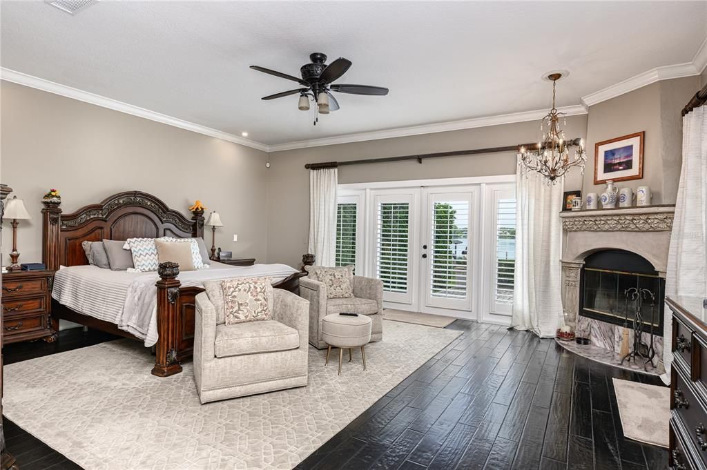 Bedroom, Chandelier, Fireplace, Interior, Recessed Lighting, Wood Texture Flooring