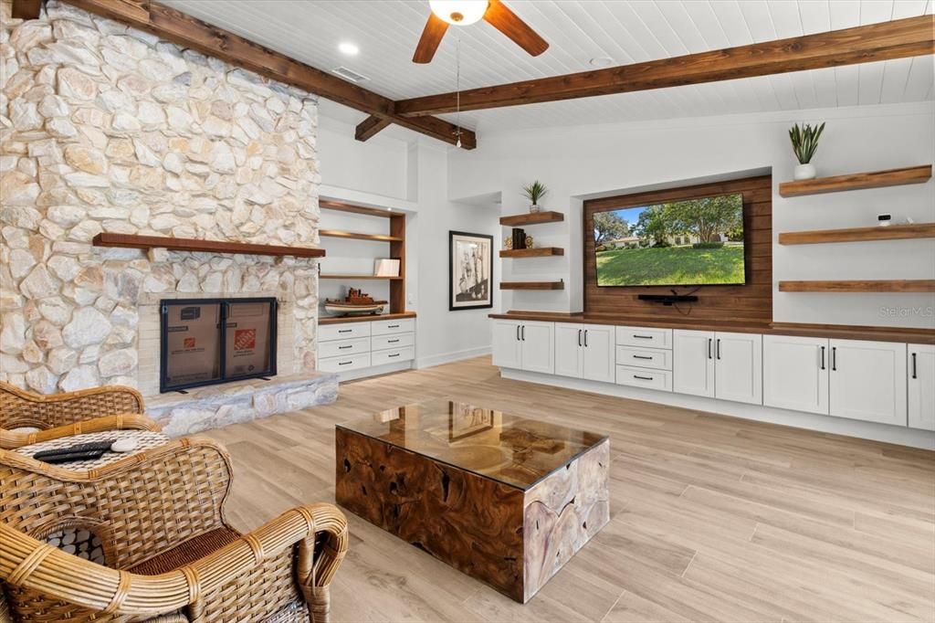Fireplace, Interior, Living room, Recessed Lighting, Stone Walls, Wooden Beams, Wood Texture Flooring