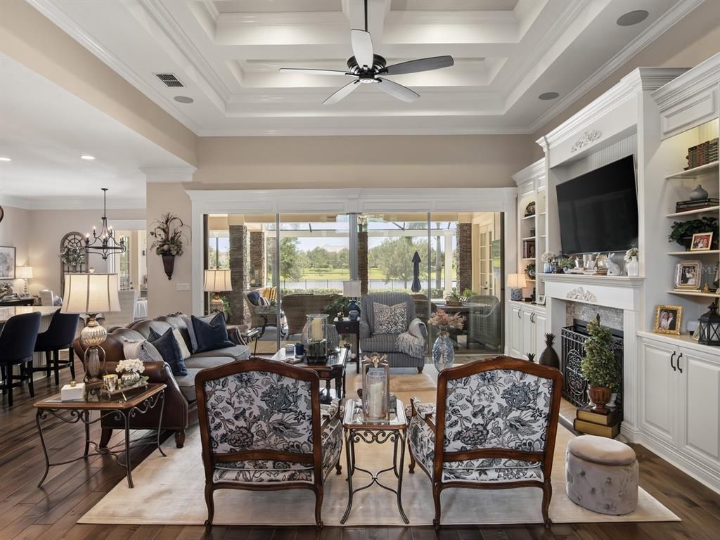 Chandelier, Dining room, Fireplace, Interior, Living room, Recessed Lighting, Wood Texture Flooring
