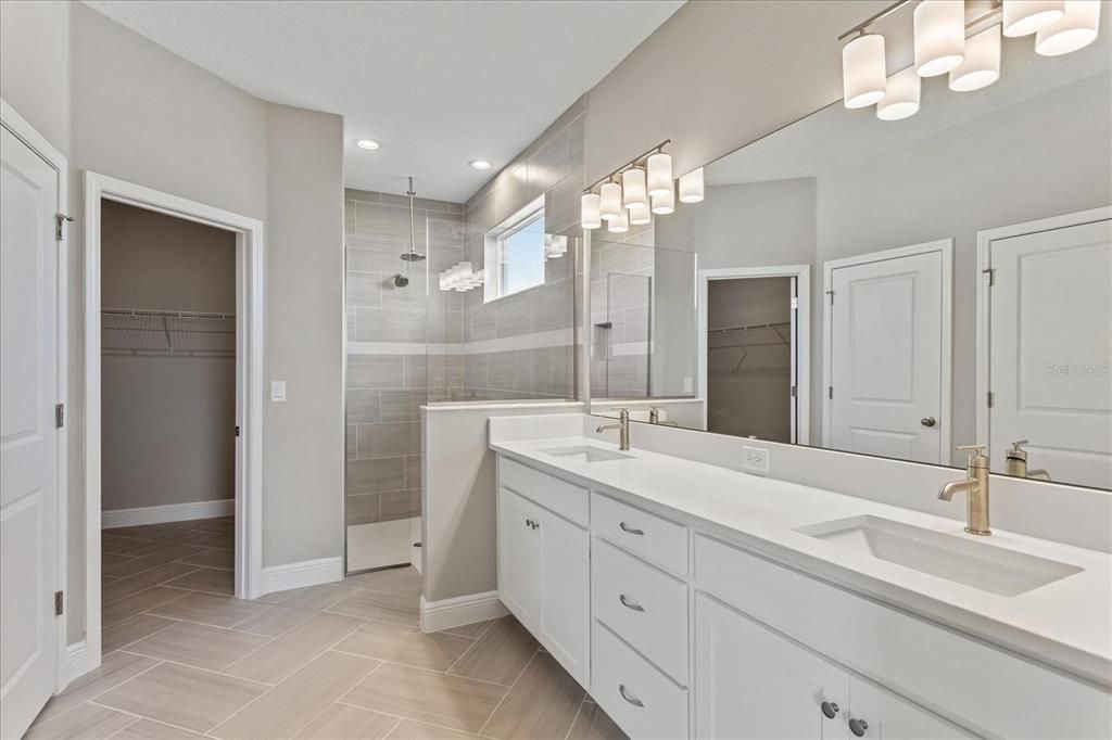 Bathroom, Dual Sink Vanities, Glass Shower, Interior, Recessed Lighting, Walk-in Closets