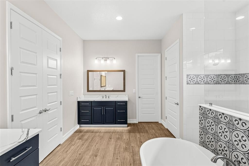 Bathroom, Free Standing Baths, Interior, Recessed Lighting, Wood Texture Flooring