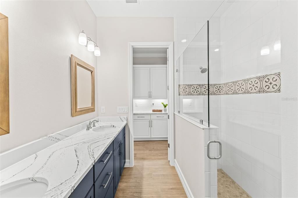 Bathroom, Dual Sink Vanities, Glass Shower, Interior, Wood Texture Flooring