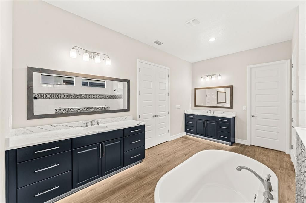Bathroom, Dual Sink Vanities, Free Standing Baths, Interior, Recessed Lighting, Wood Texture Flooring