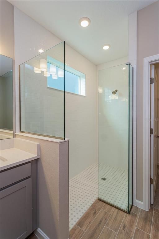 Bathroom, Glass Shower, Interior, Recessed Lighting, Wood Texture Flooring