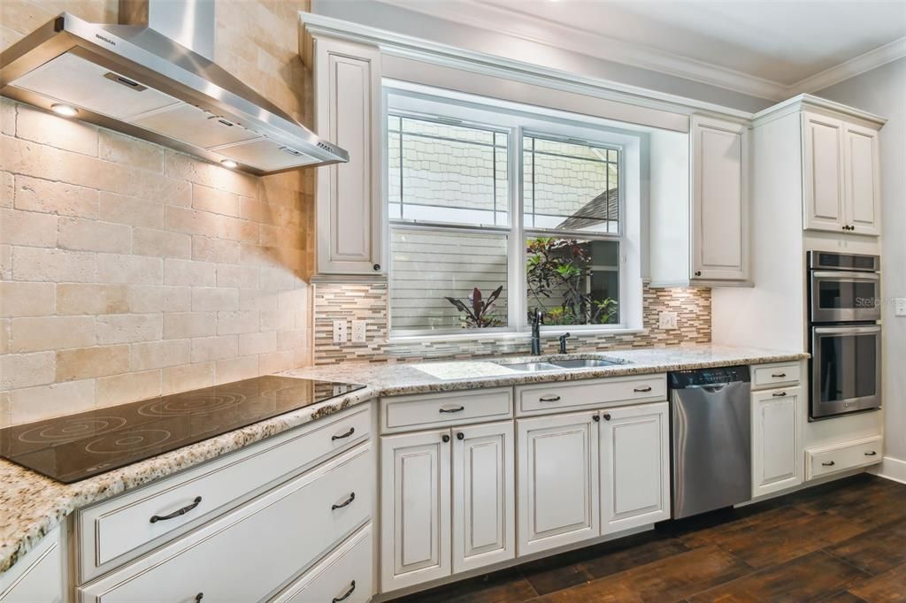 Interior, Kitchen, Recessed Lighting, Stainless Steel Appliances, Stone Walls, Wood Texture Flooring