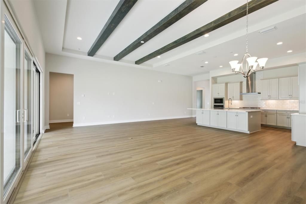 Chandelier, Interior, Kitchen, Recessed Lighting, Stainless Steel Appliances, Wooden Beams, Wood Texture Flooring