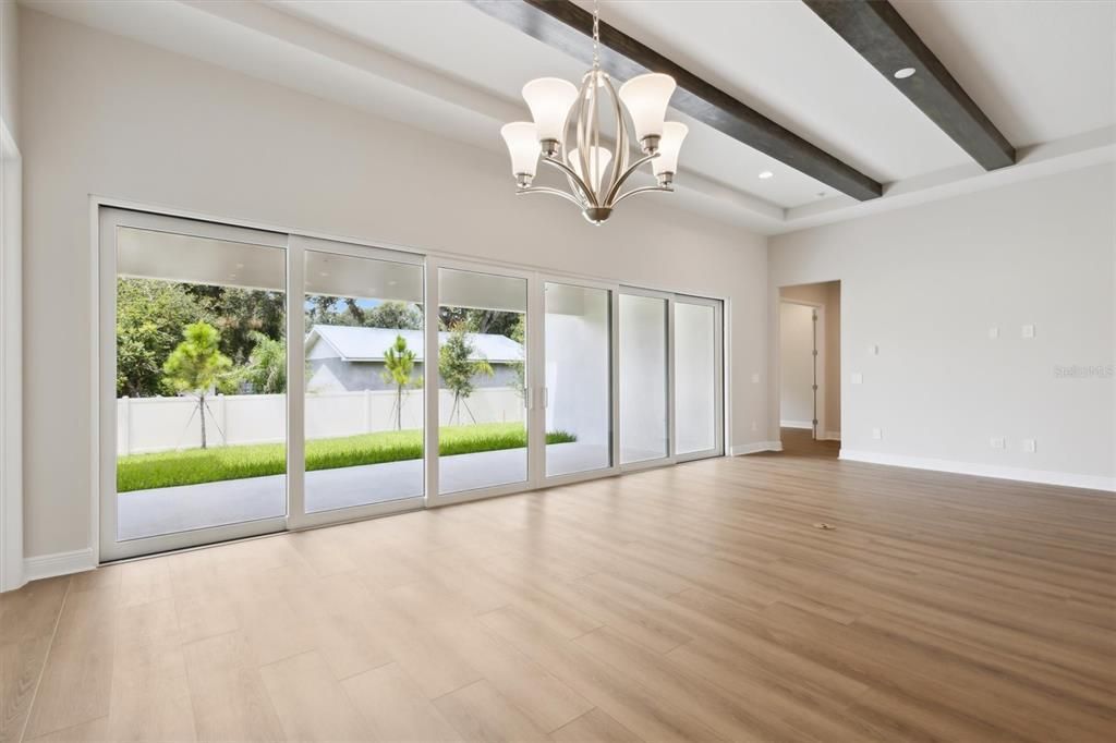 Chandelier, Empty room, Interior, Recessed Lighting, Wooden Beams, Wood Texture Flooring
