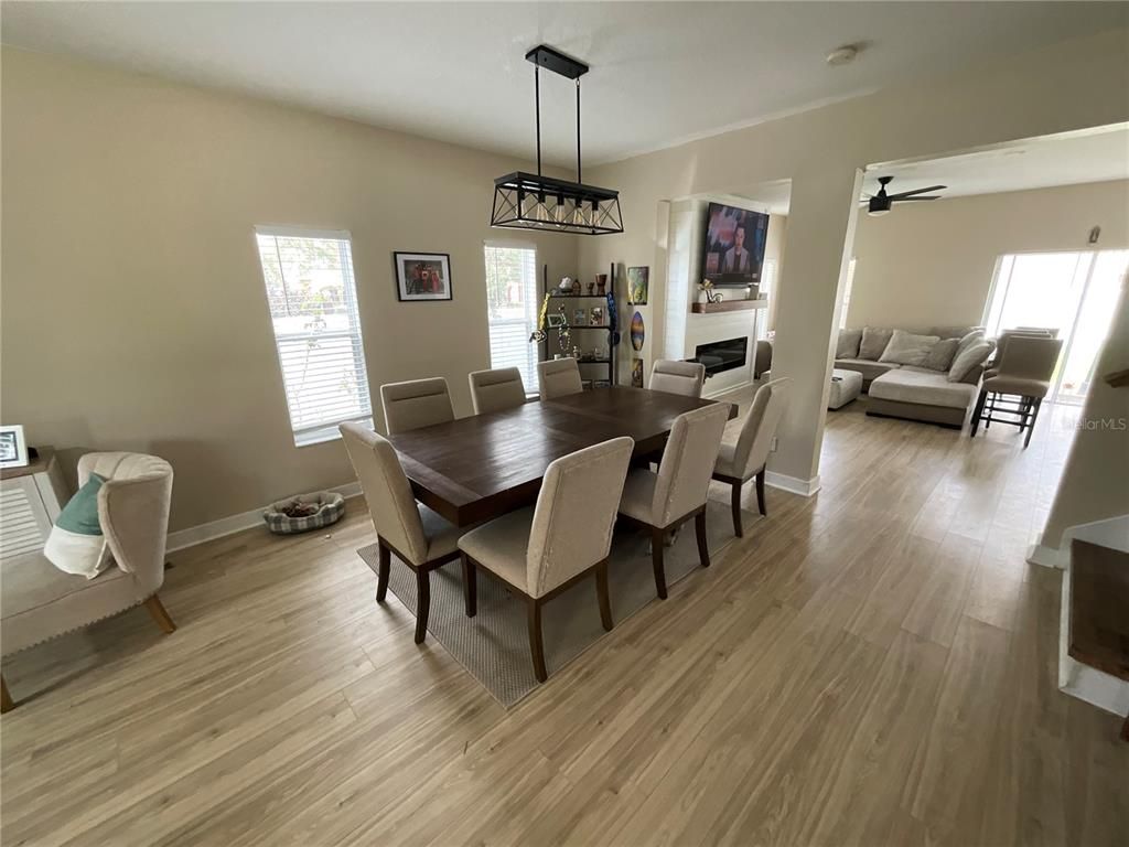 Dining room, Fireplace, Interior, Living room, Pendant Lights, Wood Texture Flooring